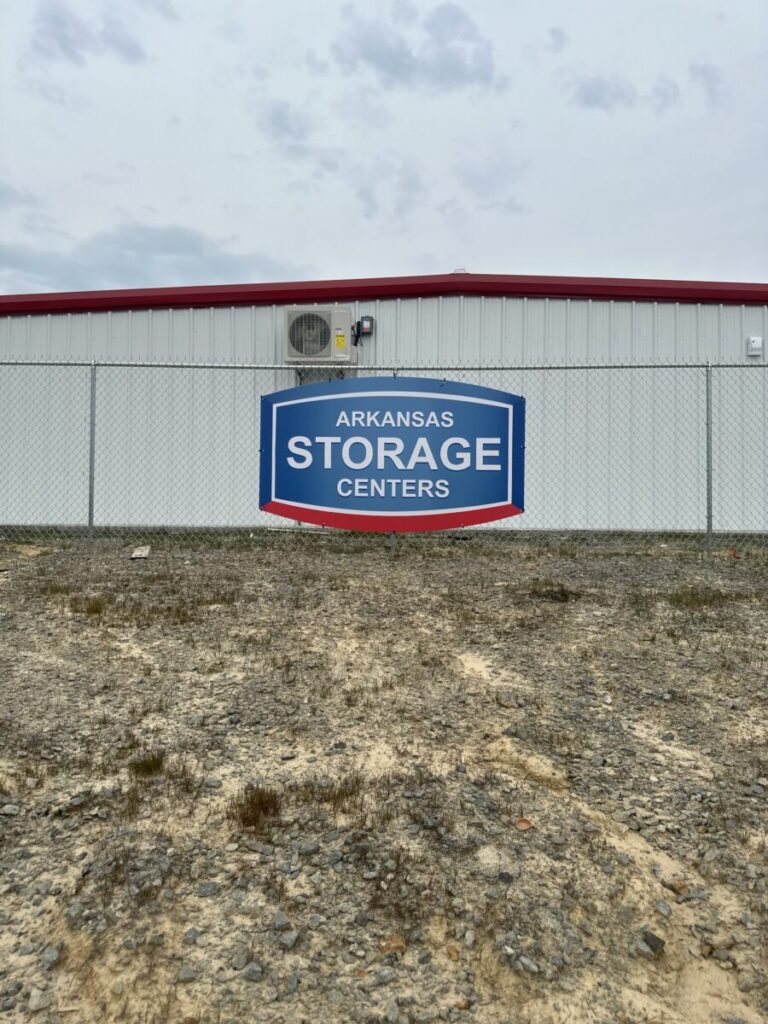 Signs on fencing and buildings - pegasus signs and printing